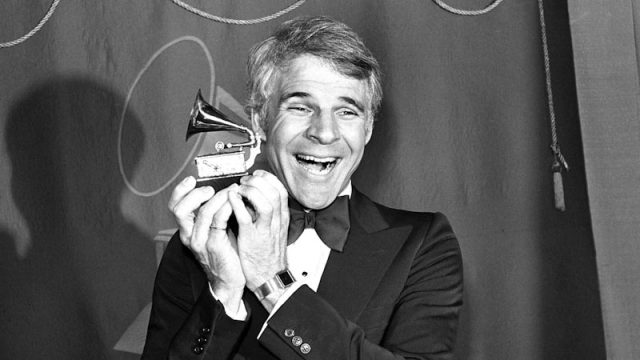 Steve Martin holds the Grammy Award which he won for Best Comedy Recording for the album A Wild And Crazy Guy, in Los Angeles on 15 February 1979.